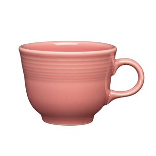 The Fiesta Retired Classic 7 3/4 OZ Tea Cup in peony features a handle and subtle horizontal ridges near the rim. This charming, lead-safe china tea cup is displayed against a plain white background.