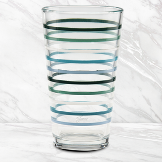 A set of 4 Moderne Glass 16 oz. Fiesta Aegean Thin Stripe Cooler Glasses with green and blue stripes rests on a white marble surface, matching the marble background. Made in the USA.