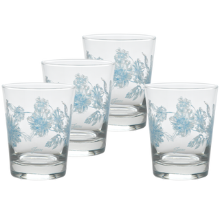 A set of four Moderne Glass Botanical Floral 15 oz. Tapered Double Old Fashion glasses, featuring blue floral designs, is displayed in a staggered arrangement against a plain white background.