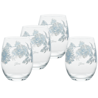 A set of four Moderne Glass Botanical Floral 15 oz. stemless wine glasses, each with light blue floral designs and "Jussta" printed on them, are arranged in a staggered row against a white background.