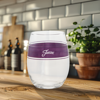 A set of four Retired 15 oz. Fiesta® Frame Stemless Wine Mulberry glasses by Moderne Glass sits on a wooden kitchen counter, featuring a clear design with a purple stripe and "Fiesta" printed on each glass.