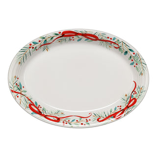 The Fiesta Holly Berry Christmas Garland 13 5/8 Inch Large Oval Serving Platter features a festive border of green pine, red berries, and ribbon—perfect holiday tableware to brighten and celebrate your Christmas gatherings.