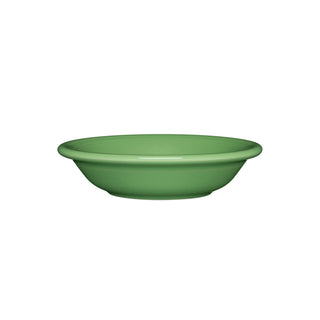 The Fiesta Fruit Bowl 6 OZ in meadow is a round, shallow green ceramic bowl with a wide rim, shown on a white background. This stylish dish is microwave safe for your convenience.