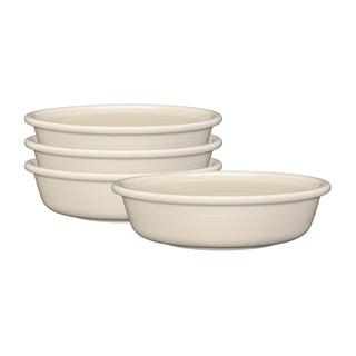 The Fiesta Linen Set includes 4 classic rim 6 7/8 inch cereal bowls (19 oz) in a cream hue, stackable and elegantly arranged to showcase versatile dinnerware on a white background.