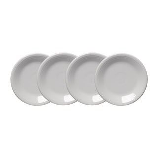Four Fiesta White Classic Rim 7 1/4 Inch Salad Plates, from a set of 4, are arranged in a slightly overlapping row on a white background.
