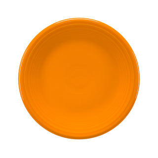A round Fiesta Retired Classic Rim 7 1/4 Inch Salad Plate in butterscotch, made in the USA from lead-safe china, is shown from above on a white background with subtle concentric ridges near the rim and a smooth surface.