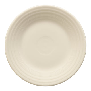 The Fiesta Classic Rim 9 Inch Luncheon Plate in Linen features subtle concentric ridges along the rim. Made in the USA, this off-white plate is shown from above on a white background.
