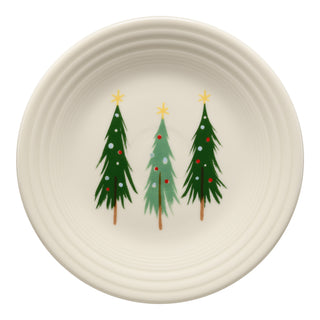 The Fiesta Jolly Christmas Three Trees Classic Rim 9 Inch Luncheon Plate, made in the USA, features three decorated Christmas trees with yellow stars and red ornaments on a white background.