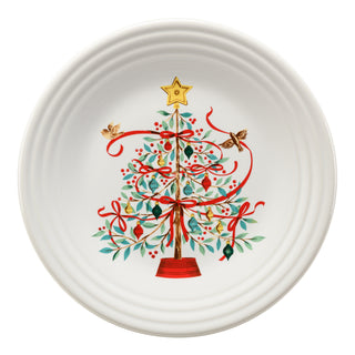 The Fiesta Holly Berry Christmas Tree Classic Rim 9 Inch Luncheon Plate features a festive tree with red ribbons, ornaments, a gold star, and birds—ideal holiday dinnerware.