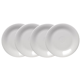 The Fiesta White Classic Rim 10 1/2 Inch Dinner Plate Set includes four plain white ceramic plates, arranged in a slightly overlapping row on a white background.