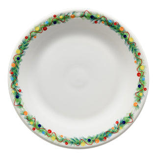 The Fiesta Retired Christmas Tree on White Classic Rim 10 1/2 Inch Dinner Plate features a festive border of green pine branches, colorful ornaments, and lights. Made in the USA.