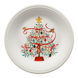 The Fiesta Holly Berry Christmas Tree Classic Rim 10 1/2 Inch Dinner Plate features a festive tree with red ribbons, ornaments, berries, two birds, and a gold star on a plain white background.