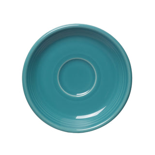 Turquoise Fiesta Retired Classic Rim 5 7/8 Inch Saucer viewed from above on a white background. Made in the USA, this glossy saucer features the classic rim design and central circular indentation in signature Fiesta color.