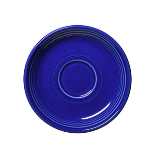 A round, twilight blue Fiesta Retired Classic Rim 5 7/8 Inch Saucer with a glossy finish and concentric ridges, seen from above on a white background. Made in the USA.