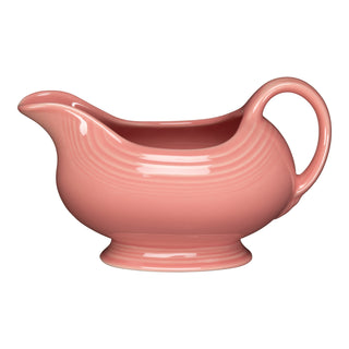 The Retired Fiesta 18 1/2 OZ Gravy Sauceboat in Peony features a glossy finish, curved spout, rounded body, and large handle—perfect for serving sauces. Shown on a white background.