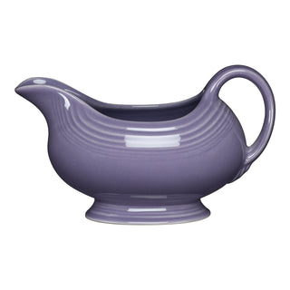 The Fiesta Lavender 18 1/2 OZ Gravy Sauceboat, featuring a curved spout and handle for easy pouring, is shown on a white background.
