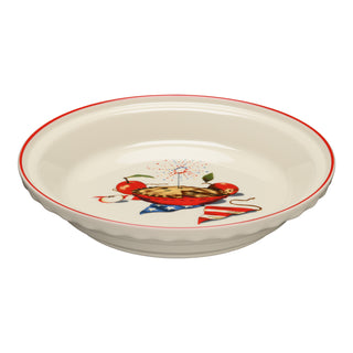 The Fiesta Americana Apple Pie 10 1/4 Inch Deep Dish Pie Baker (44oz) features a cream finish with a red rim and center art of a pie, apples, American flag, and fireworks—a charming slice of Americana bakeware.
