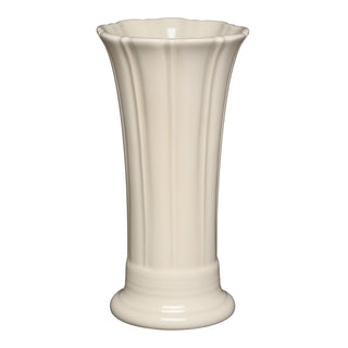 The Fiesta 9 5/8 Inch Medium Vase by Fiesta features a linen color, fluted design, round base, and a slightly flared, scalloped rim.