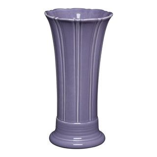 The Fiesta Lavender 9 5/8 Inch Medium Vase features an Art Deco design with vertical ridges and a flared, scalloped rim in lilac, displayed against a white background.