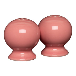 The Retired Fiesta 2 5/8 Inch Salt and Pepper Shaker Set in Peony features round, glossy pink ceramic shakers—a charming Art Deco-inspired addition to any Fiesta Dinnerware collection.