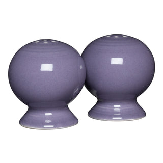 The Fiesta Lavender 2 5/8 Inch Salt and Pepper Shaker Set features glossy, round ceramic shakers with a wide base—ideal for adding stylish flair to your Fiesta Dinnerware collection.