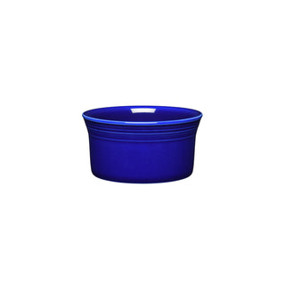 The Retired Fiesta 8 OZ Ramekin (4 Inch) by Fiesta, in twilight, is a small, round ceramic ramekin—oven safe and USA-made—with a flared rim and subtle horizontal top ridges, shown against a plain white background.