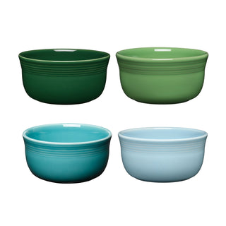 The Fiesta Mixed Aegean All-Purpose 6-Inch 28OZ Gusto Bowls, Set of 4, features bowls in dark green, light green, teal, and light blue—microwave safe and ideal for adding color and style to your table.