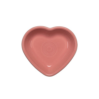 The Fiesta Retired Small Heart Bowl, a pink ceramic plate shaped like a heart, is ideal as a jewelry holder or bowl. Shown from above on a white background.