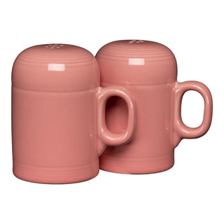 The Fiesta Retired 4 5/8" Rangetop Large Salt and Pepper Shaker Set in Peony features two vitrified china shakers with handles, mug-like shapes, dispensing holes on top, and is dishwasher safe.