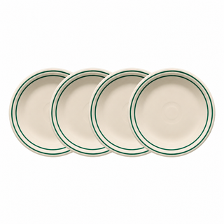 Four beige Fiesta Americana Jade Band 7 1/4-Inch Classic Rim Salad Plates, each featuring a double green rim, overlap in a row on a white background. This lead-safe set adds timeless elegance to any table setting.