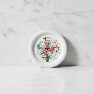 The Fiesta Nutcracker Sugar Plum Fairy 4 3/8 Inch Coaster and Mug Cover features a festive fairy with a candy cane, holly, ribbons, and stars—ideal for holiday decor on your table or countertop.