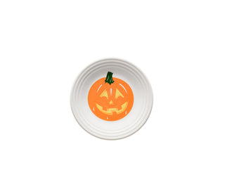 A Fiesta Retired Jack-o-Lantern Pumpkin Classic Rim 6 1/8 Inch Appetizer Plate, featuring a smiling pumpkin design, made in the USA and set against a plain white background.