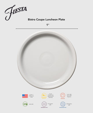 A Lavender Bistro Coupe 9-inch Luncheon Plate by Fiesta is centered on a gray background. Icons below show it’s lead safe, oven and microwave safe, dishwasher safe china, and made in the USA.