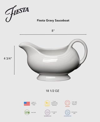 The Retired Fiesta 18 1/2 OZ Gravy Sauceboat is a white ceramic piece with a handle, measuring 8" long by 4.75" tall. Made in the USA, it’s microwave, dishwasher, and oven safe—ideal for serving sauces.
