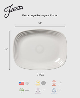 The Retired Fiesta 12 Inch Large Rectangular Platter by Fiesta is a white, lead-free serving tray (12"x9", 36 oz) with embossed rings. Made in the USA, it's oven, microwave, and dishwasher safe and comes with a five-year chip warranty.