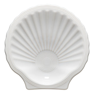 The Fiesta Retired Shell Shaped Plate, 8 1/4 inch in white, features ridged details and a glossy finish—an ideal ocean-inspired piece for your Coastal Collection.