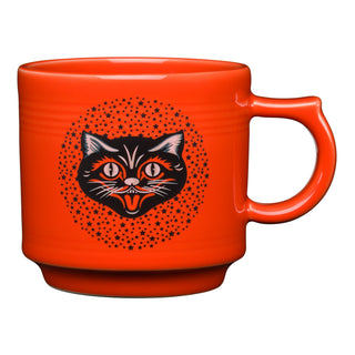 The Fiesta Retired Black Cat 16 OZ Stackable Mug features bright orange vitrified china with a black cat's face, open mouth, wide eyes, and small black stars. Durable and dishwasher safe.