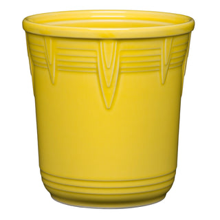 The Retired Fiesta 7 Inch Chevron Utensil Crock by Fiesta features a bright yellow ceramic finish with chevron ridges, making it a cheerful kitchen canister or utensil holder, shown against a white background.