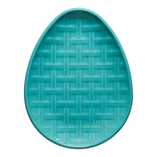 The Fiesta Retired Embossed Egg Shaped Plate, 10-inch in turquoise, features a woven basket-like pattern and is photographed on a white background—ideal for highlighting your Fiesta Tableware collection.
