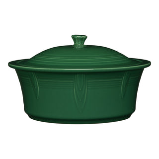The Fiesta Large 10 Inch Round Covered Casserole, 2.8 Quart in jade, is a USA-made ceramic dish with an oven-safe matching lid featuring subtle vertical and horizontal lines plus a small handle.