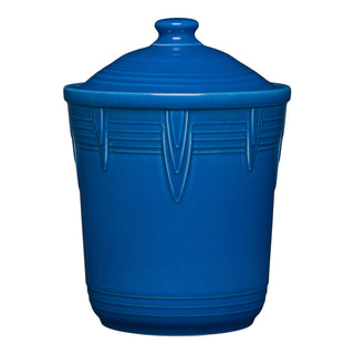 The Retired Fiesta 2 Quart Medium Chevron Canister in lapis features vertical embossed patterns, an airtight lid with a rounded knob, and offers colorful kitchen storage from the Fiesta brand.