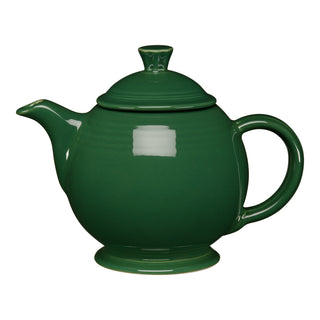 The Retired Fiesta 44 OZ Covered Teapot by Fiesta is made of lead-safe china in glossy jade, featuring a round body, curved spout, large handle, and matching lid. Dishwasher safe. Shown against a white background.