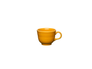 A Fiesta Retired Classic 7 3/4 OZ Tea Cup in Marigold, made in the USA, with a handle, is shown against a plain white background.