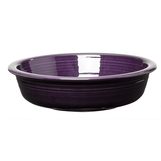 The Fiesta Retired Classic Rim 6 7/8 Inch Cereal Bowl (19 oz) in Plum features a glossy purple finish, fully vitrified china construction, and a slightly flared rim, shown against a white background.