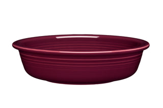 The Fiesta Retired Classic Rim 6 7/8 Inch Cereal Bowl, Claret color, is a deep, round, glossy ceramic bowl with subtle ridges, made from fully vitrified china and shown against a white background. Capacity: 19 oz.
