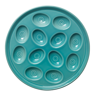 The Fiesta Retired Round Egg Serving Platter, 11 1/4 inch in turquoise, is a USA-made ceramic plate featuring twelve oval indentations arranged in a circle, each detailed with concentric circles.