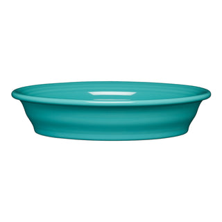 The Fiesta Retired Oval Baker, 10 1/4 in and 40 oz, features a turquoise finish with a wide, shallow shape and slightly raised rim, shown against a white background.