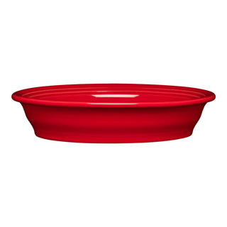 The image shows a Fiesta Retired Oval Baker, 10 1/4-inch, 40 oz, in scarlet. This ceramic serving dish features a wide rim, shallow oval shape, and smooth glossy finish set against a white background.