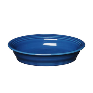 The Fiesta Retired Oval Baker, 10 1/4 in, 40 oz, features a smooth-sided, lapis blue ceramic design with a glossy finish and is shown on a white background.