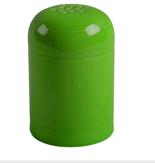 The Retired Fiesta Cheese Shaker by Fiesta, in vibrant Shamrock green, features a hand-finished, chip-resistant design with a rounded top and small dispensing holes, shown against a plain white background.